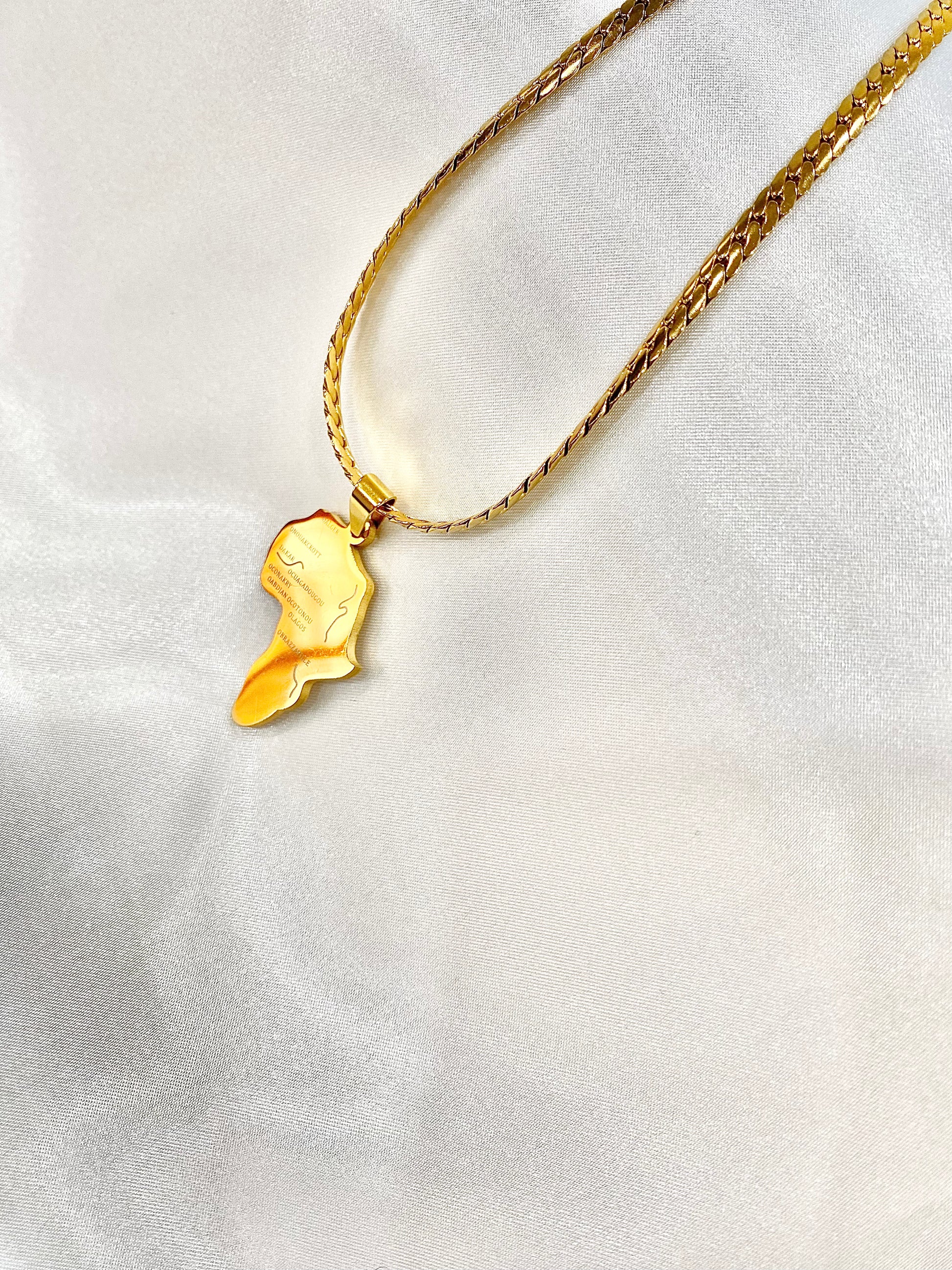 Dako - Gold Africa Map Pendant Necklace  Gold-plated stainless steel 