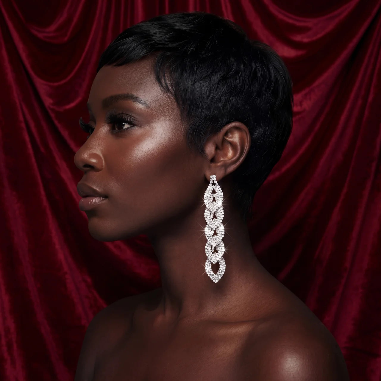 Long silver rhinestone pavé interlocking link drop earrings on kraft card display — DubyAllure Lumière Cascade